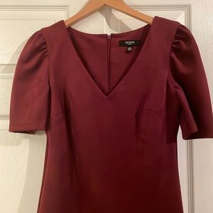 Guess mid size, burgundy, velvet touch dress. It was never worn, tags was ripped